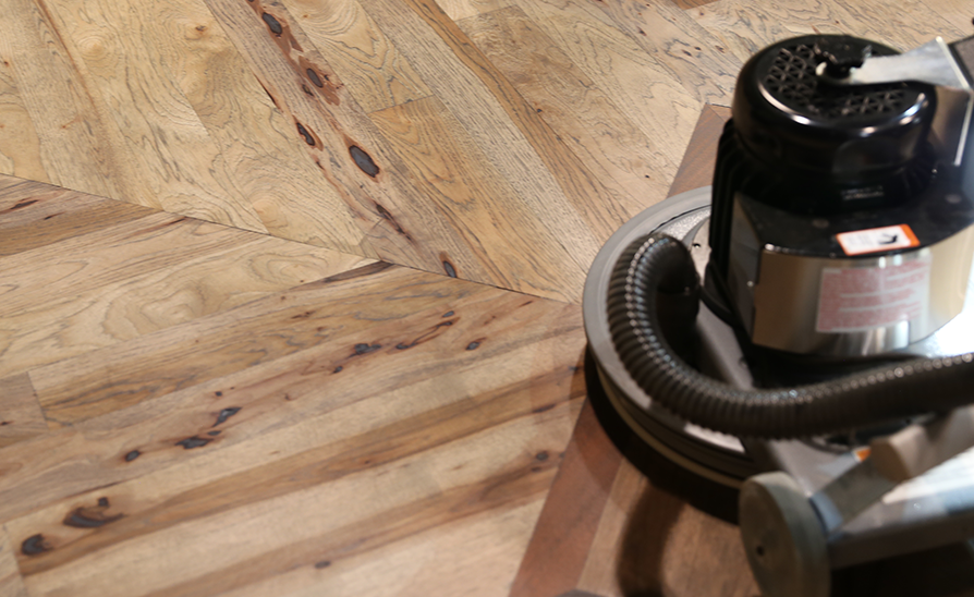 wood floor being refinished on site